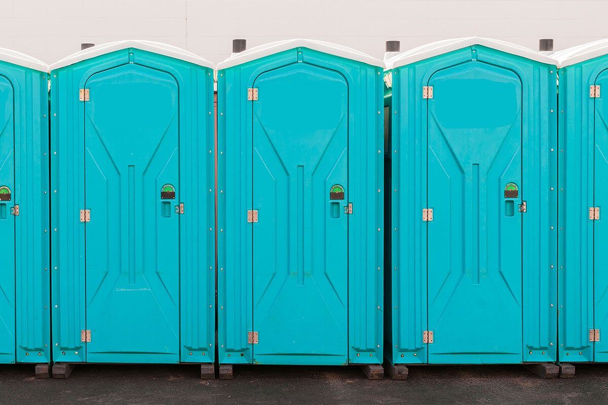 Industrial portable restroom units at a plant in Menomonie, Wisconsin